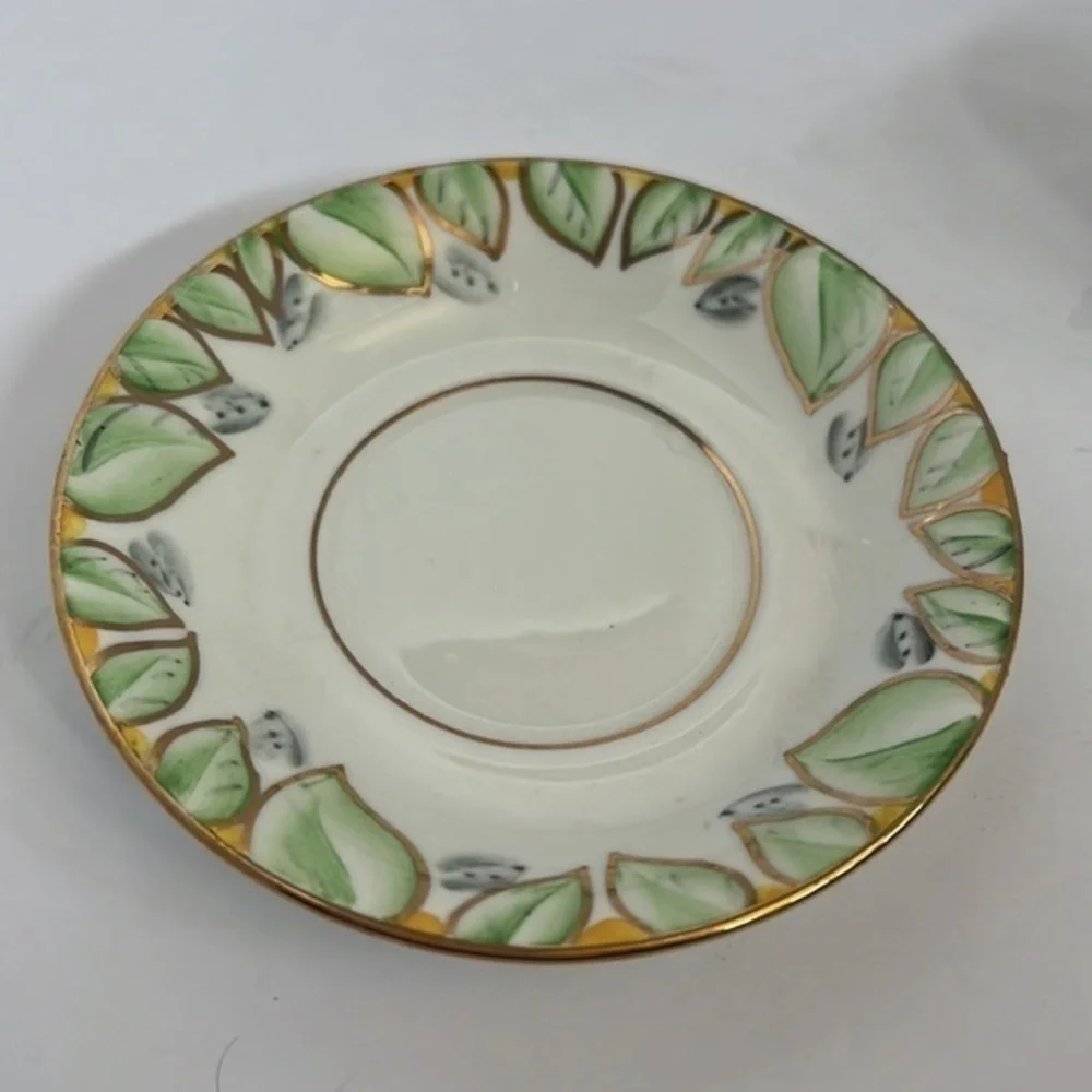 TF& S LTD, DEMITASSE CUP AND SAUCER